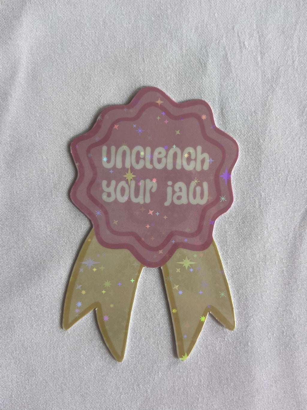 Unclench Your Jaw Badge Sticker