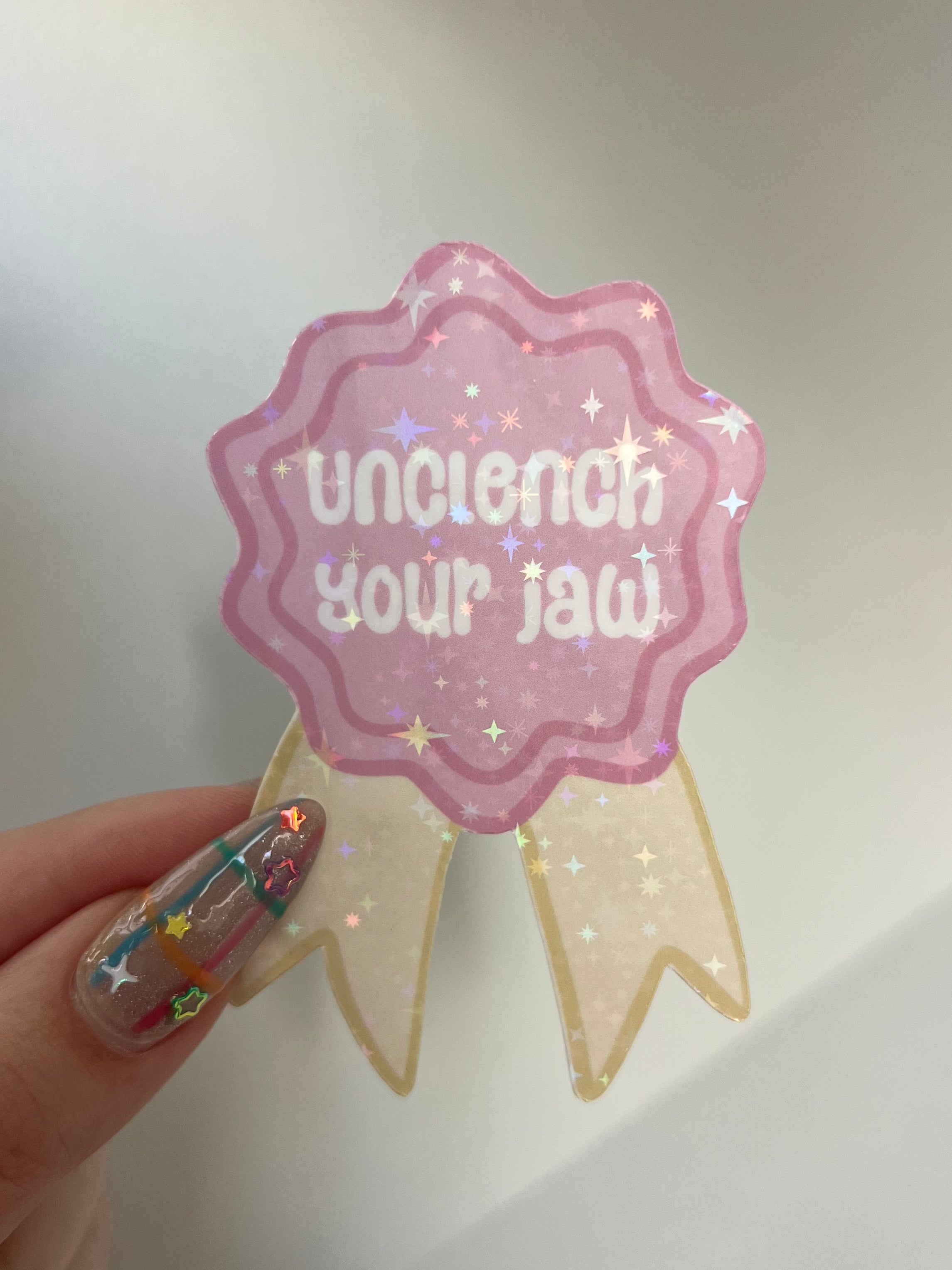 Unclench Your Jaw Badge Sticker