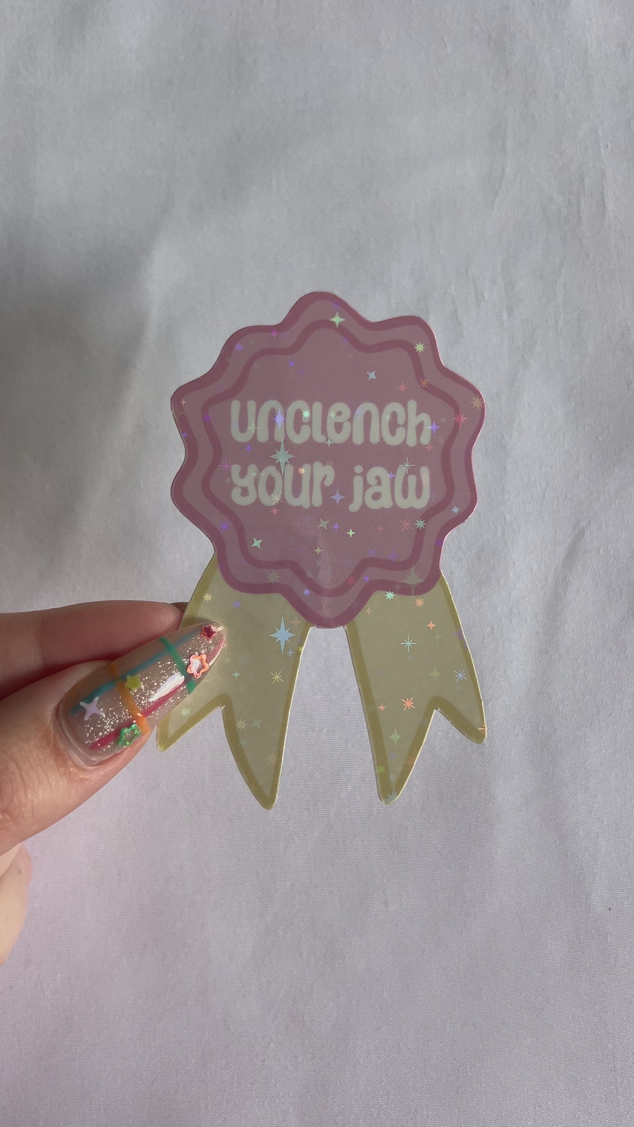 Unclench Your Jaw Badge Sticker